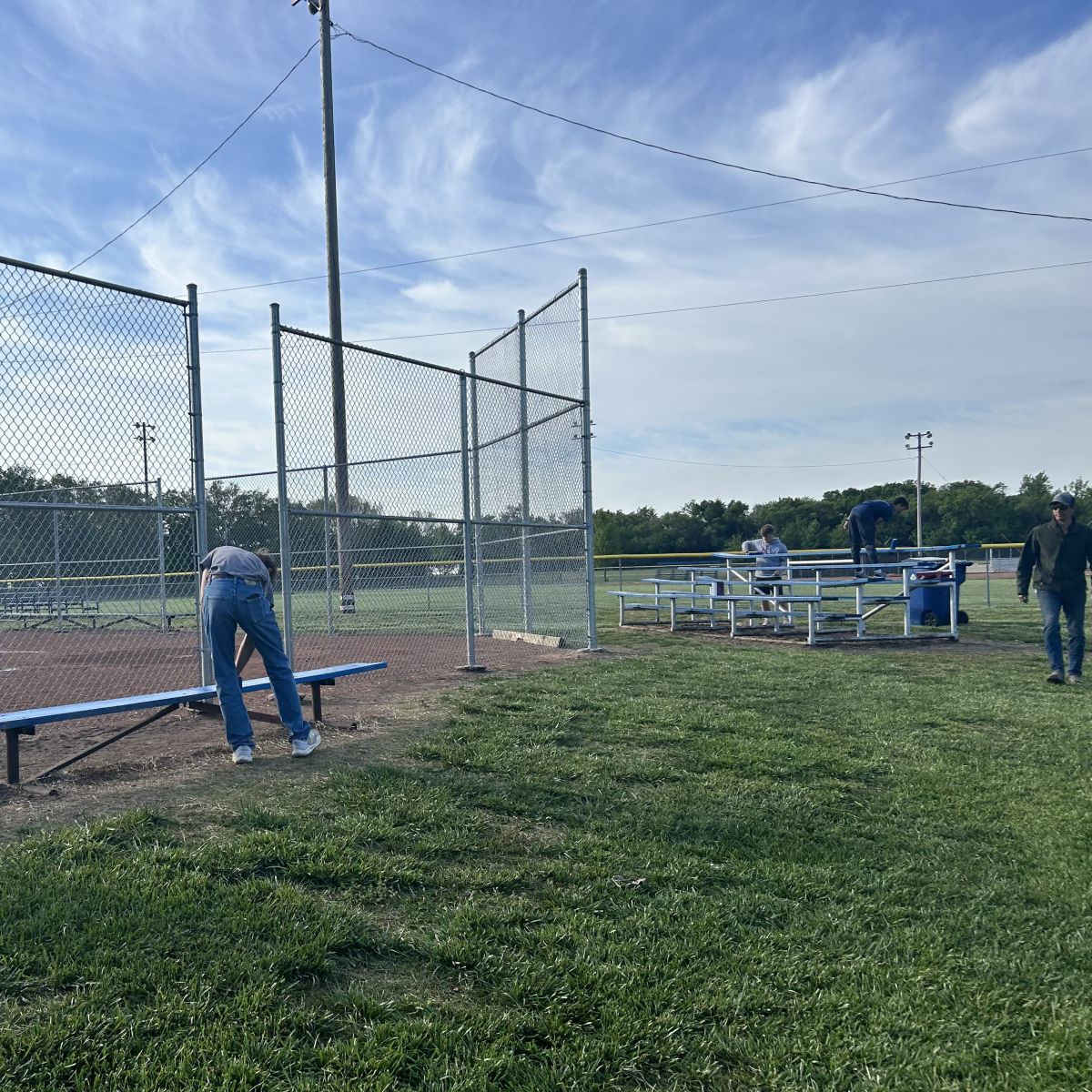 RHS Students painting Ballfield seating