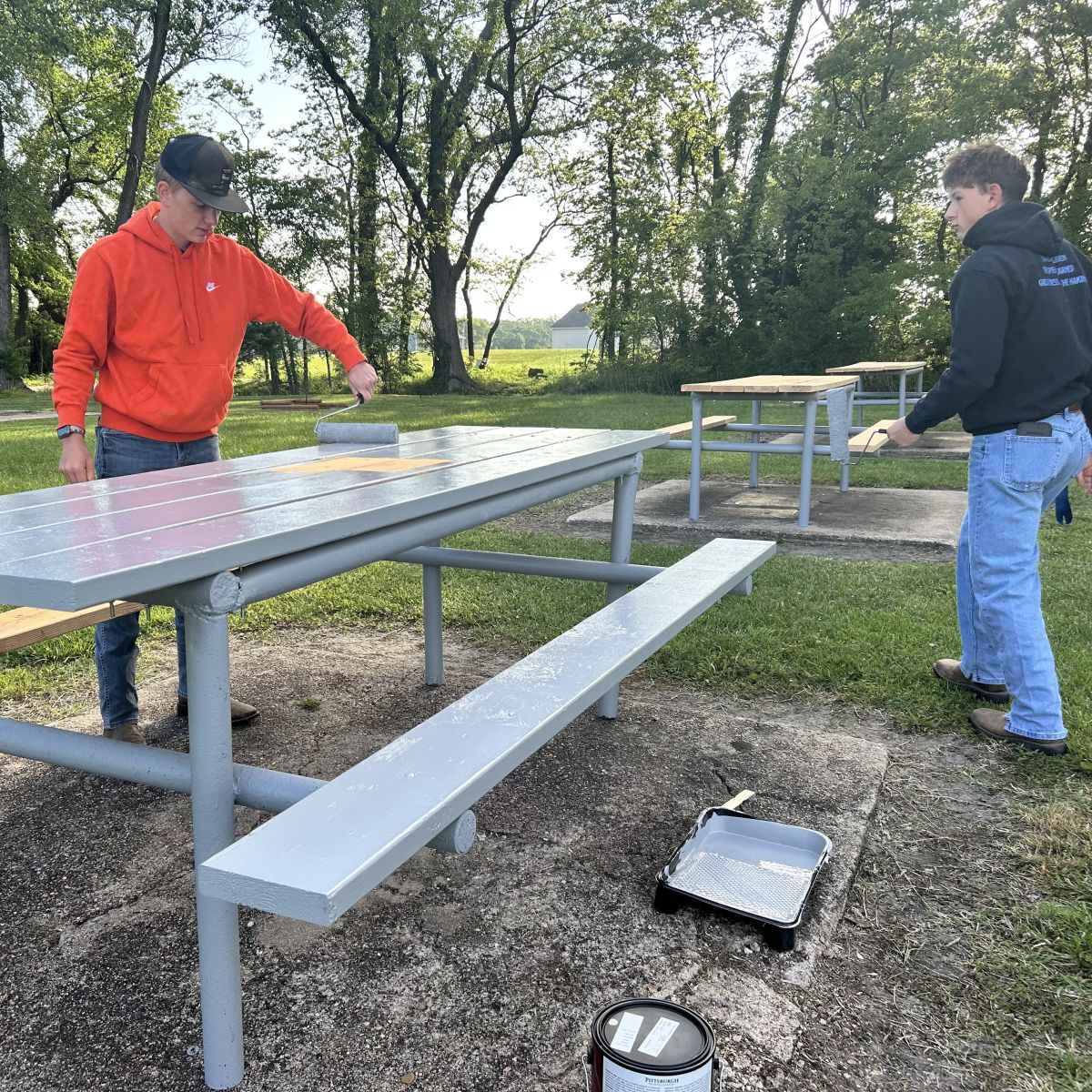 RHS students painting the picnic tables