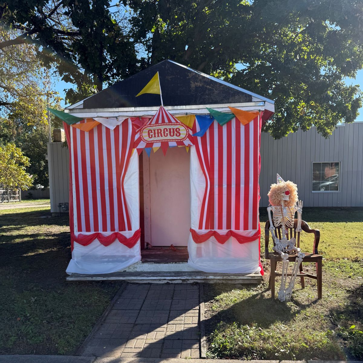 the "Haunted House" decorated with a skeleton clown sitting out front