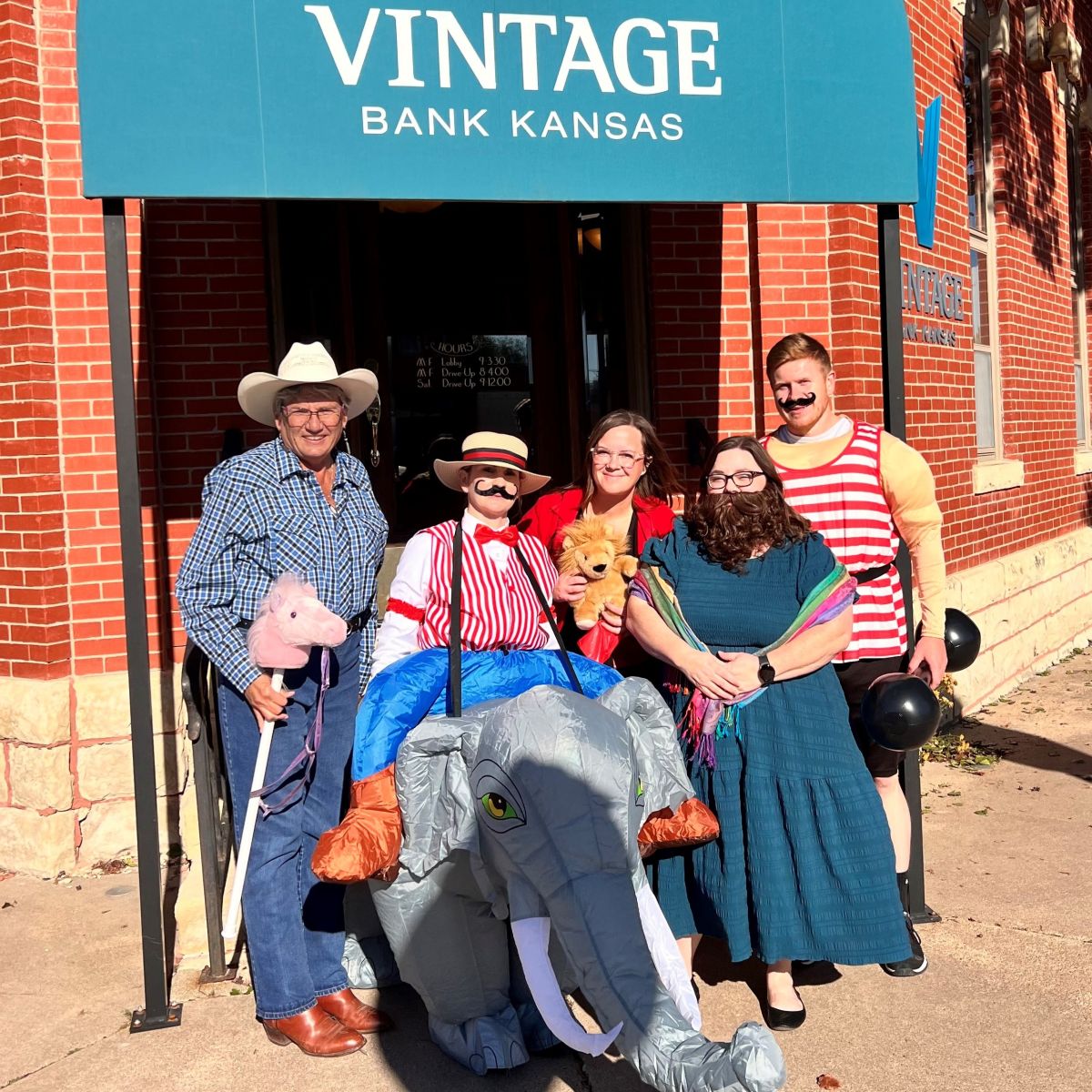 Vintage Bank employees dressed up in Circus outfits